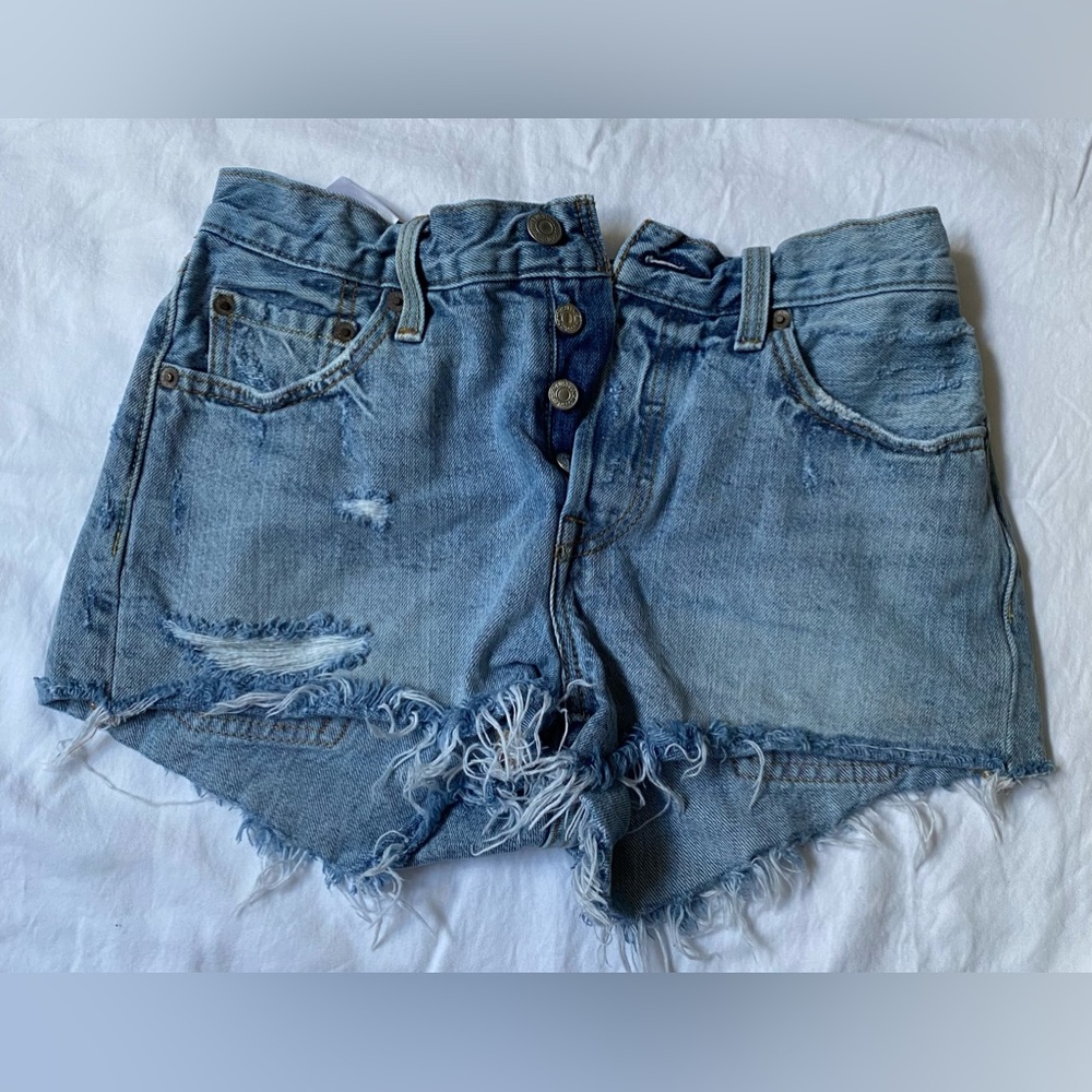 LEVI’S • Jean Shorts • Ripped Cut-off • Previously loved • 25